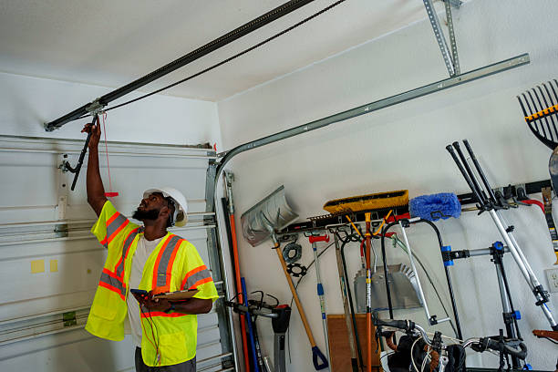 Professional Garage Door technician working in Timnath, CO